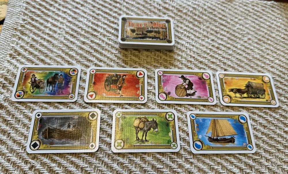 Game cards face up in a fan, none covering another.